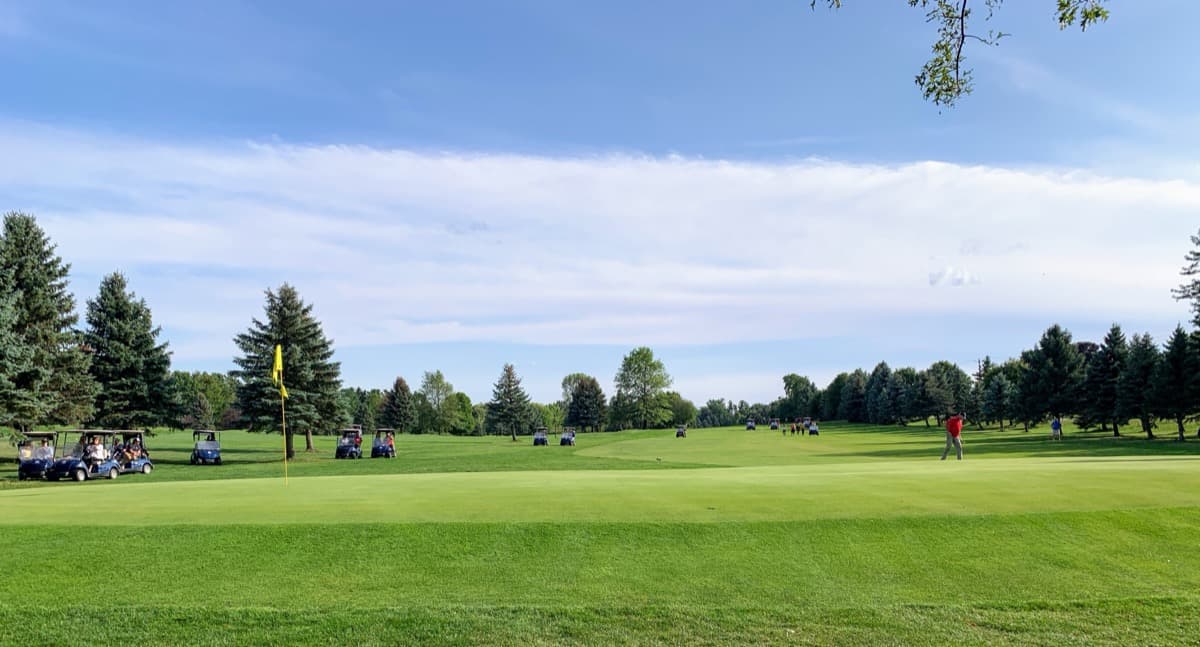 Silver Lake Golf Course green with blue sky